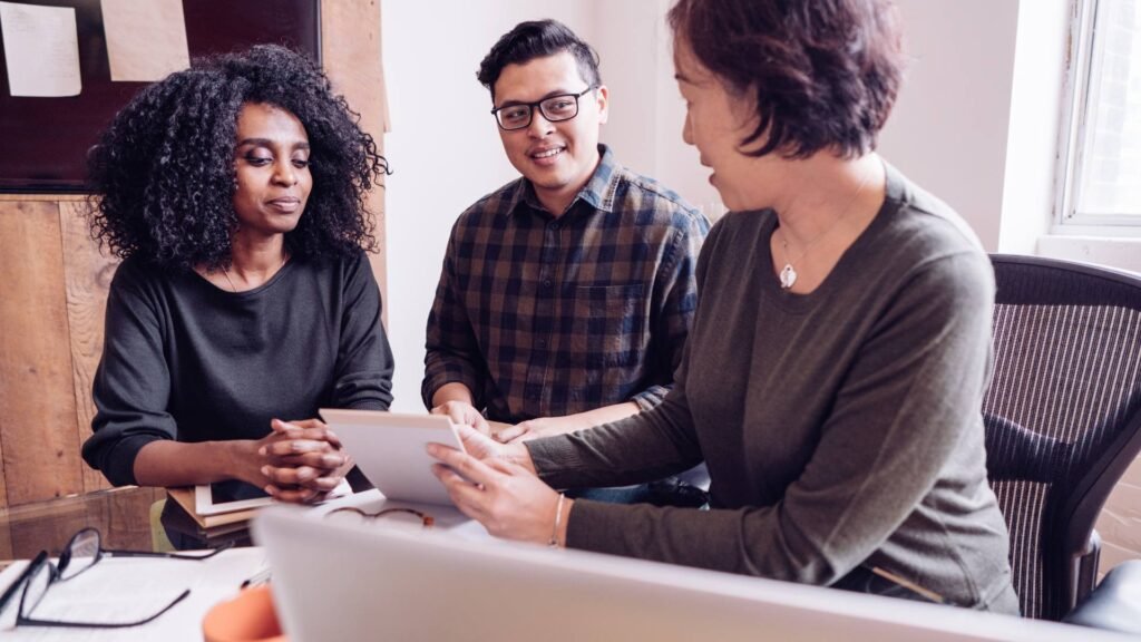 An employer and their employees discuss section 125 tax plans and benefits.